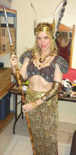 valkyrie battle maiden opera star julie brown wearing viking-gear theatrical armor and weapons and winged head gear